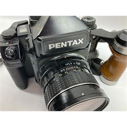 Pentax 67II camera with Asahi SMC Pentax - 6x7 ‘1:4 45mm’ lens, Asahi Takumar / 6x7 ‘1:4.5/75’ lens, Asahi Macro-Takumar / 6x7 ‘1:4/135’ lens, Asahi SMC Pentax - 6x7 ‘1:2.8 165mm’ lens, Asahi Pentax 6x7 rear converter ‘T6-2X’, lens filters and various other accessories, housed in a Billingham carry bag