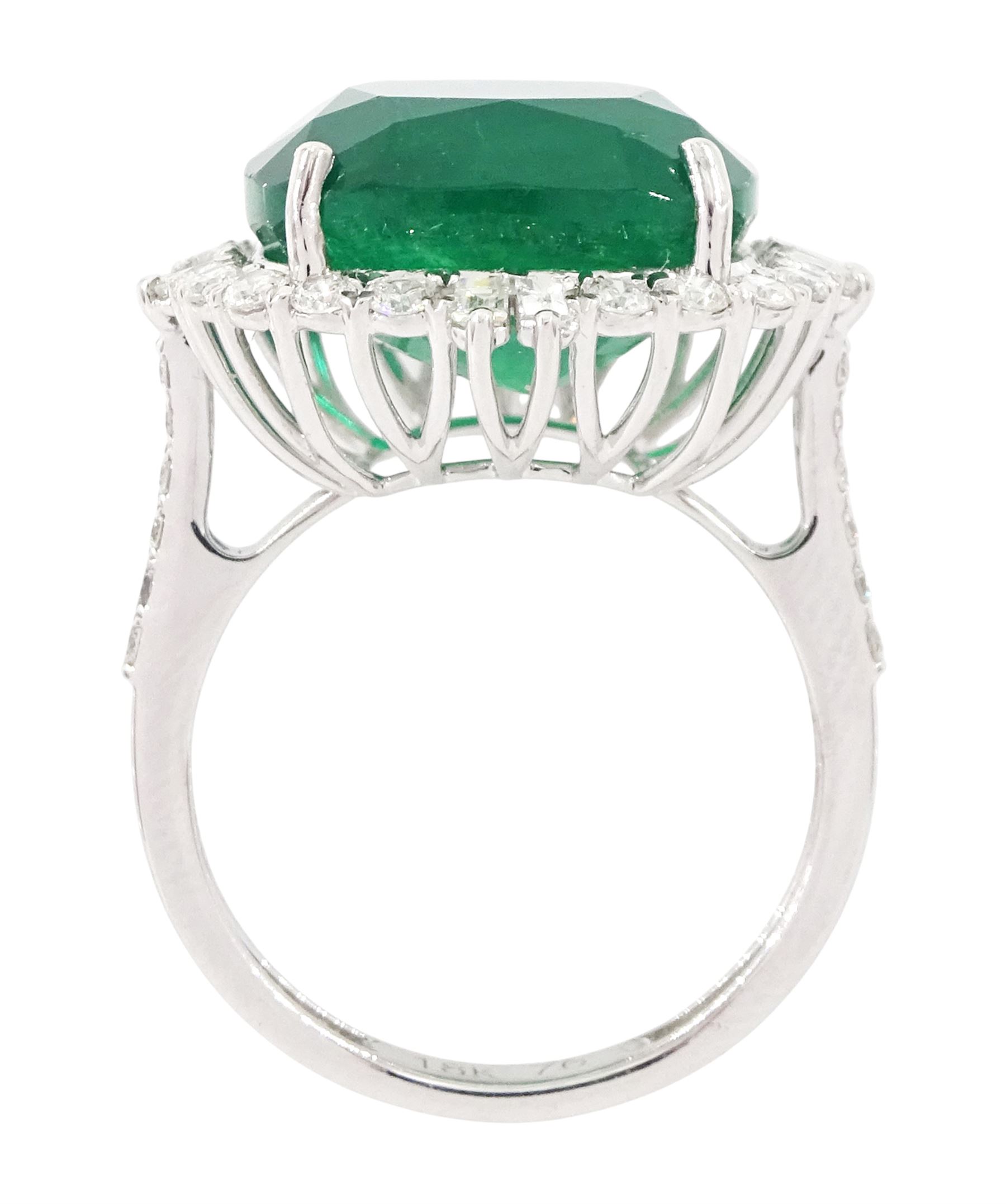 18ct white gold emerald and diamond cluster ring, single cushion cut emerald of approx 13.20 carat, with round brilliant cut and baguette cut diamond surround and shoulders, stamped, total diamond weight approx 0.80 carat