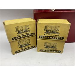 Hornby Dublo - 4620 Breakdown Crane No.133 in red with Match Trucks; boxed; another unboxed 4620 Breakdown Crane No.144 in black 'Cowans Sheldon' with Match Trucks; and nine Trackmaster goods wagons comprising three GW Open Wagons, two GW box vans, three NE Open Wagons and one NE Box Van; all boxed (11)