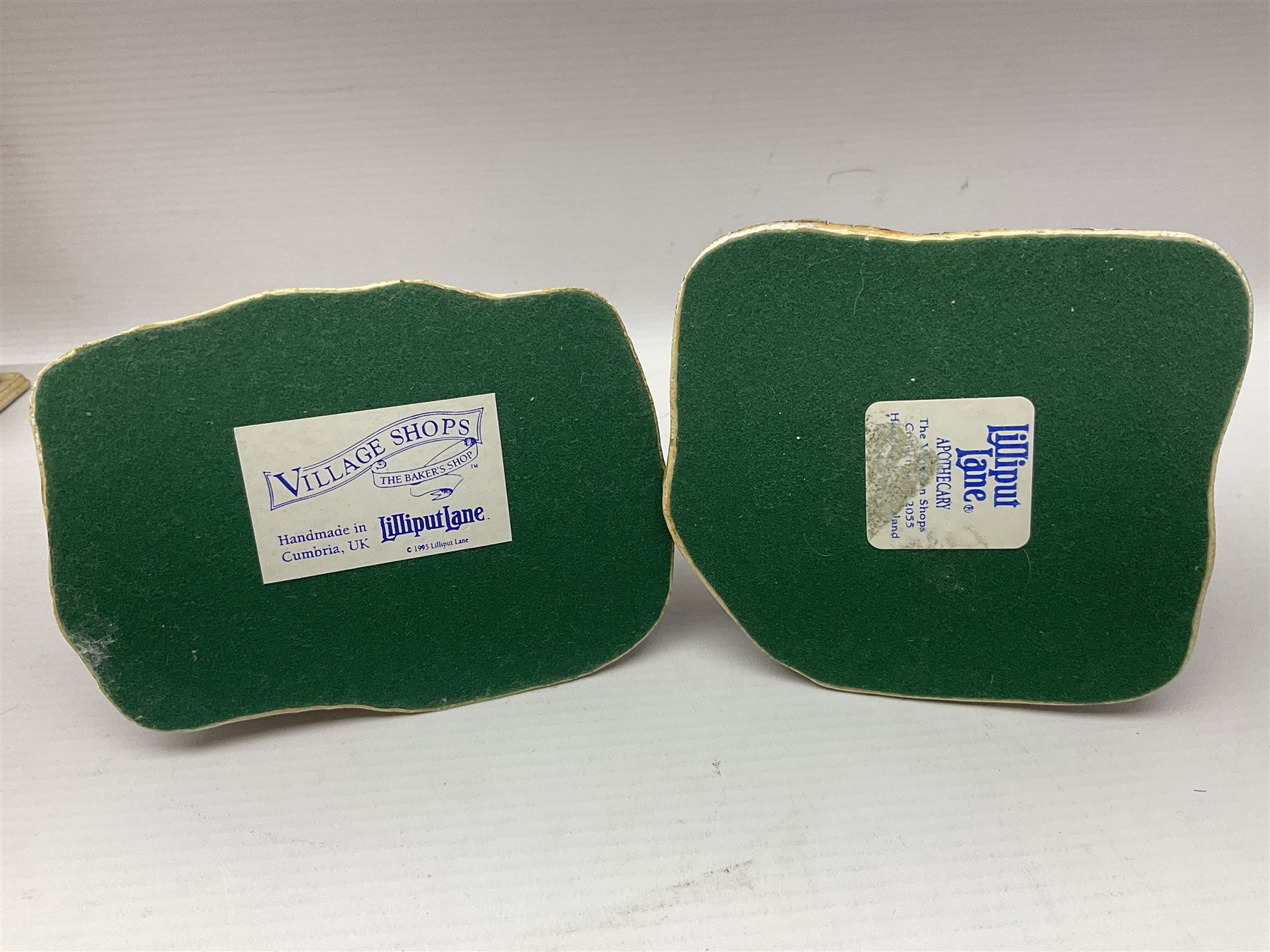 Thirteen Lilliput Lanes from the Shops Collection, including Apothecary, Horologist, China Shop, Penny Sweets, H Samuel etc, all with deeds and original boxes 