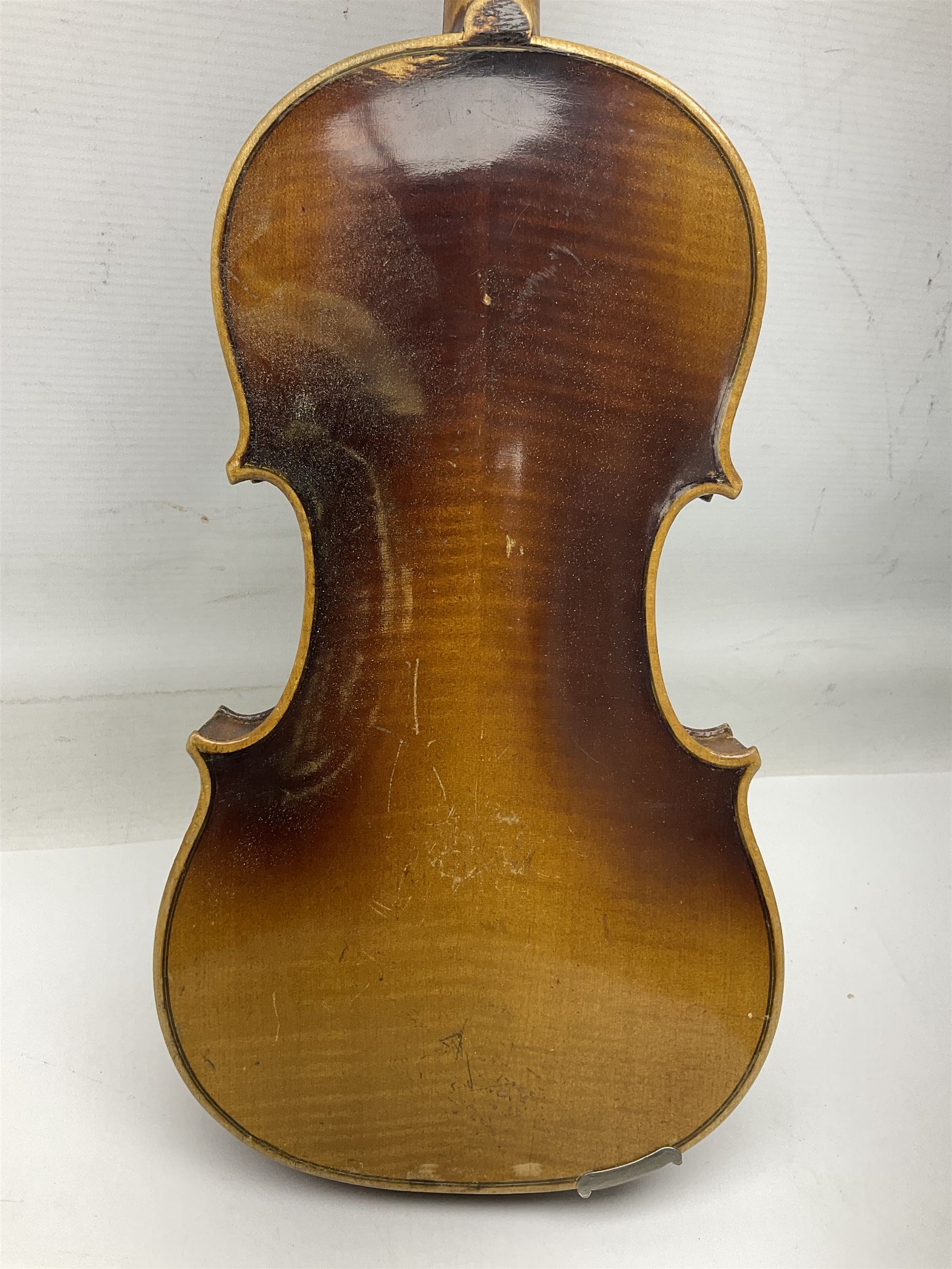 Two three-quarter size violins - German Saxony with 34cm one-piece maple back and ribs and spruce top; L56cm overall; and Hungarian with 34cm two-piece maple back and ribs and spruce top; L56cm overall; each in carrying case with bow (2)