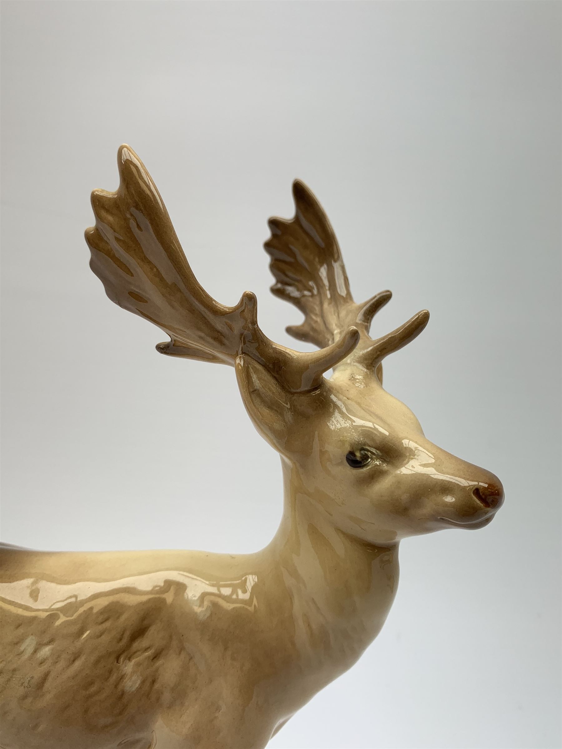 A Beswick Deer family, comprising Stag, Doe and Fawn. (3).  