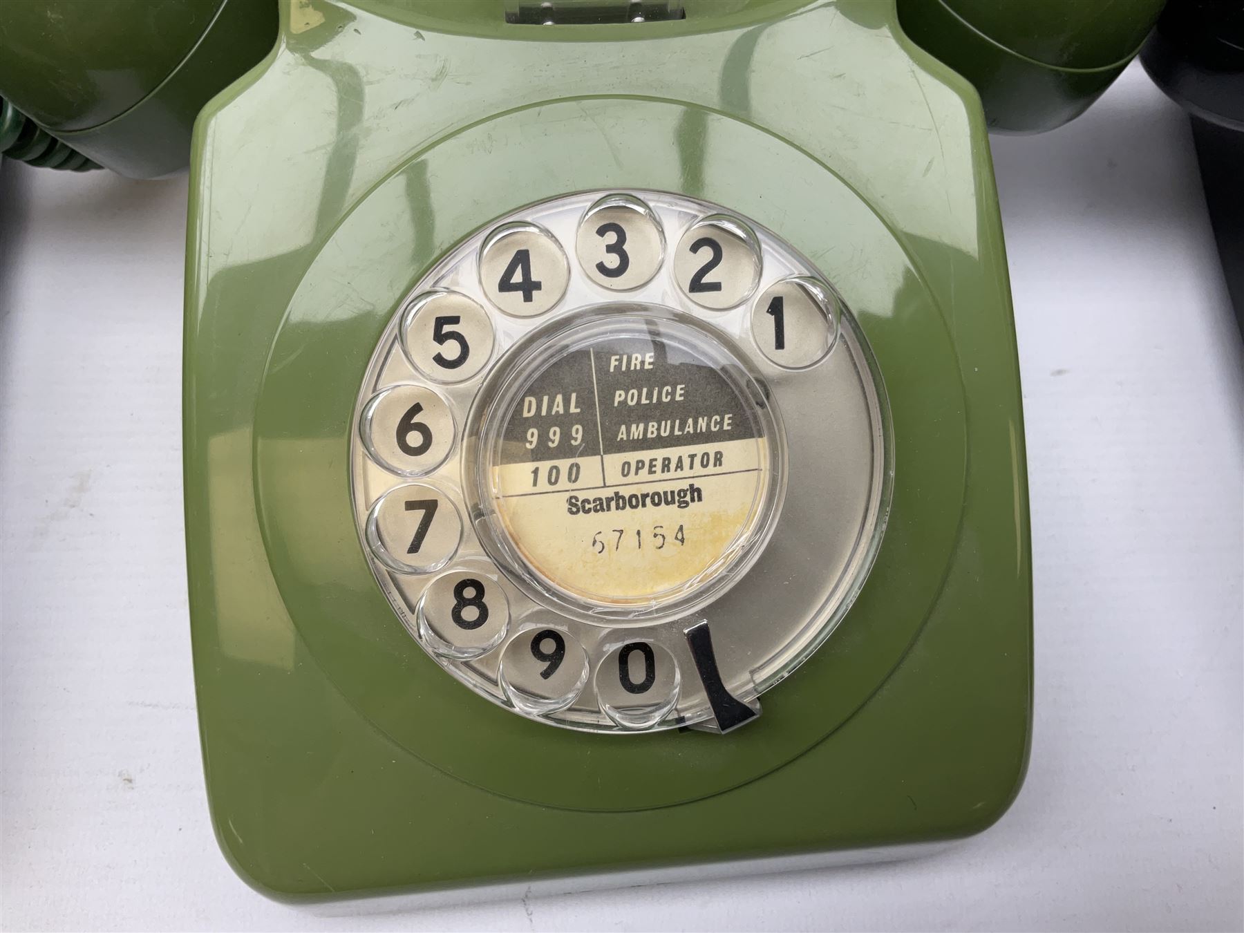 Collection of six vintage telephones, including a trimphones telephone
