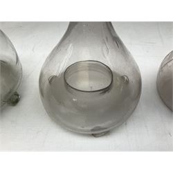 Four 19th century and later glass fly traps, tallest example H19cm