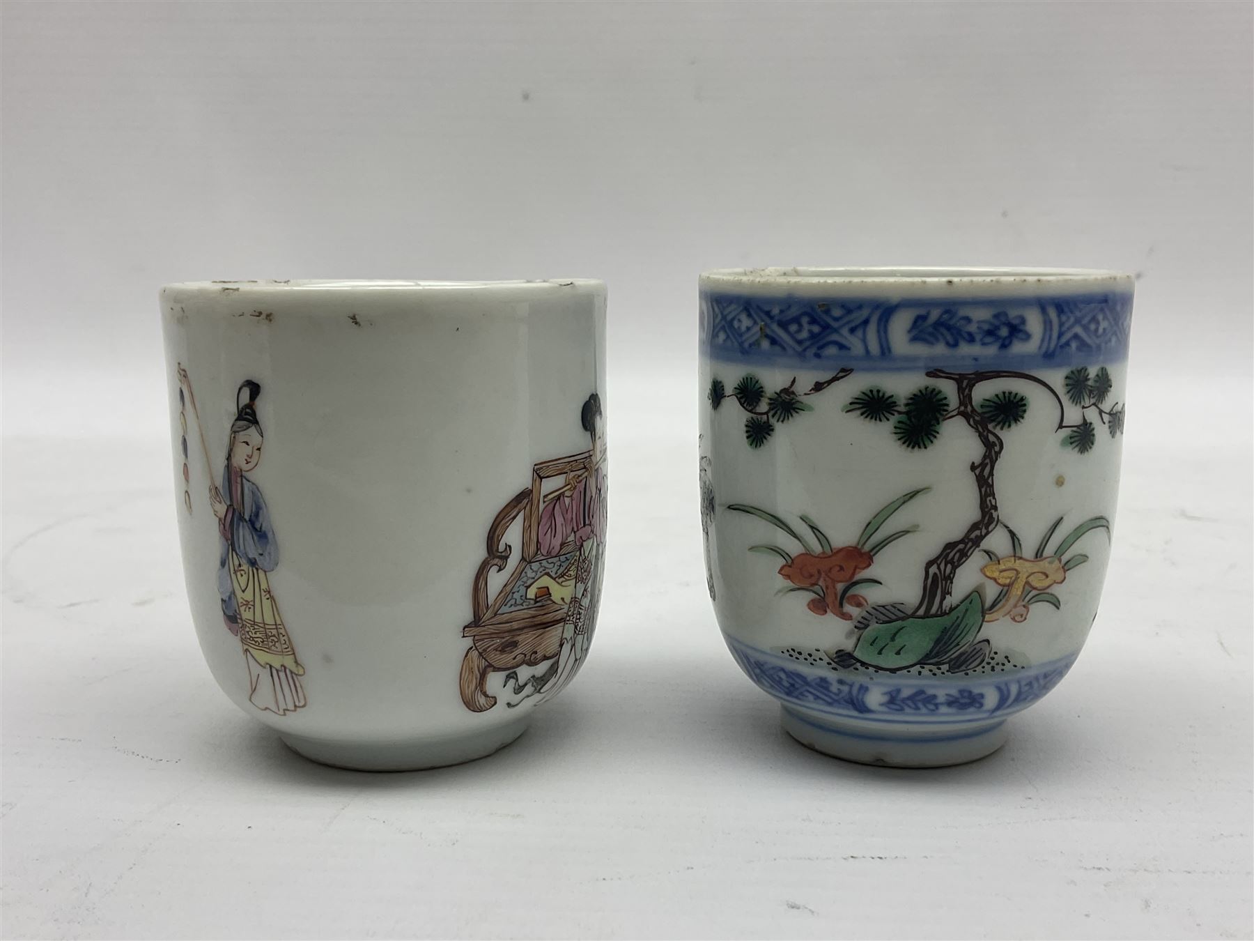 Two 18th century Chinese Yongzheng coffee cups, the first example decorated in polychrome enamel with rooster amidst blossoming peonies, the second decorated with deer and crane among rockwork and pine tree, together with two further 18th century Chinese coffee cups, an 18th century Chinese tea bowl, and a further tea bowl