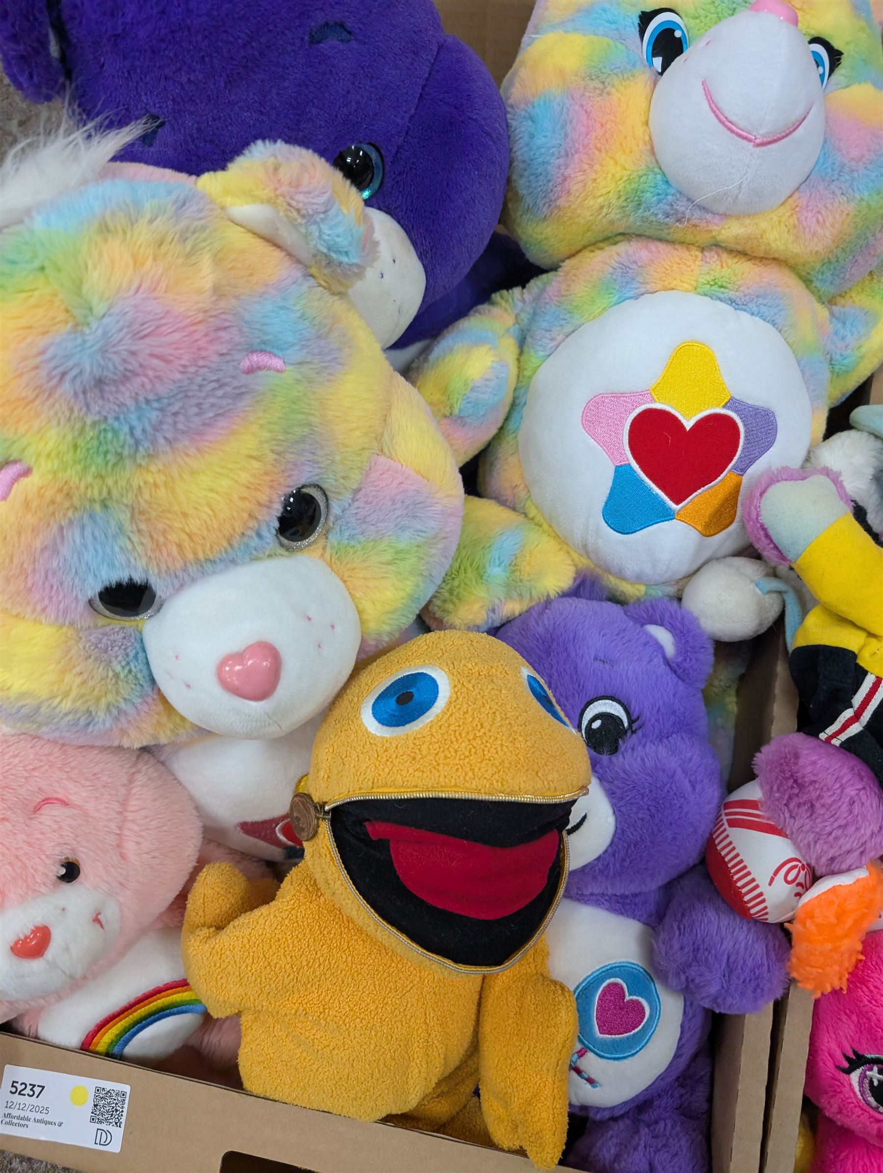Vintage toys, including Russ Troll Doll and Furby, together with a collection of Care Bears, two Pop Art elephants and similar soft toys