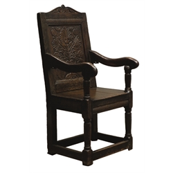  17th century and later oak Wainscot chair with scroll carved cresting, carved panel back, solid seat and scroll arms on turned and block supports joined by stretchers, H115cm, W55cm  