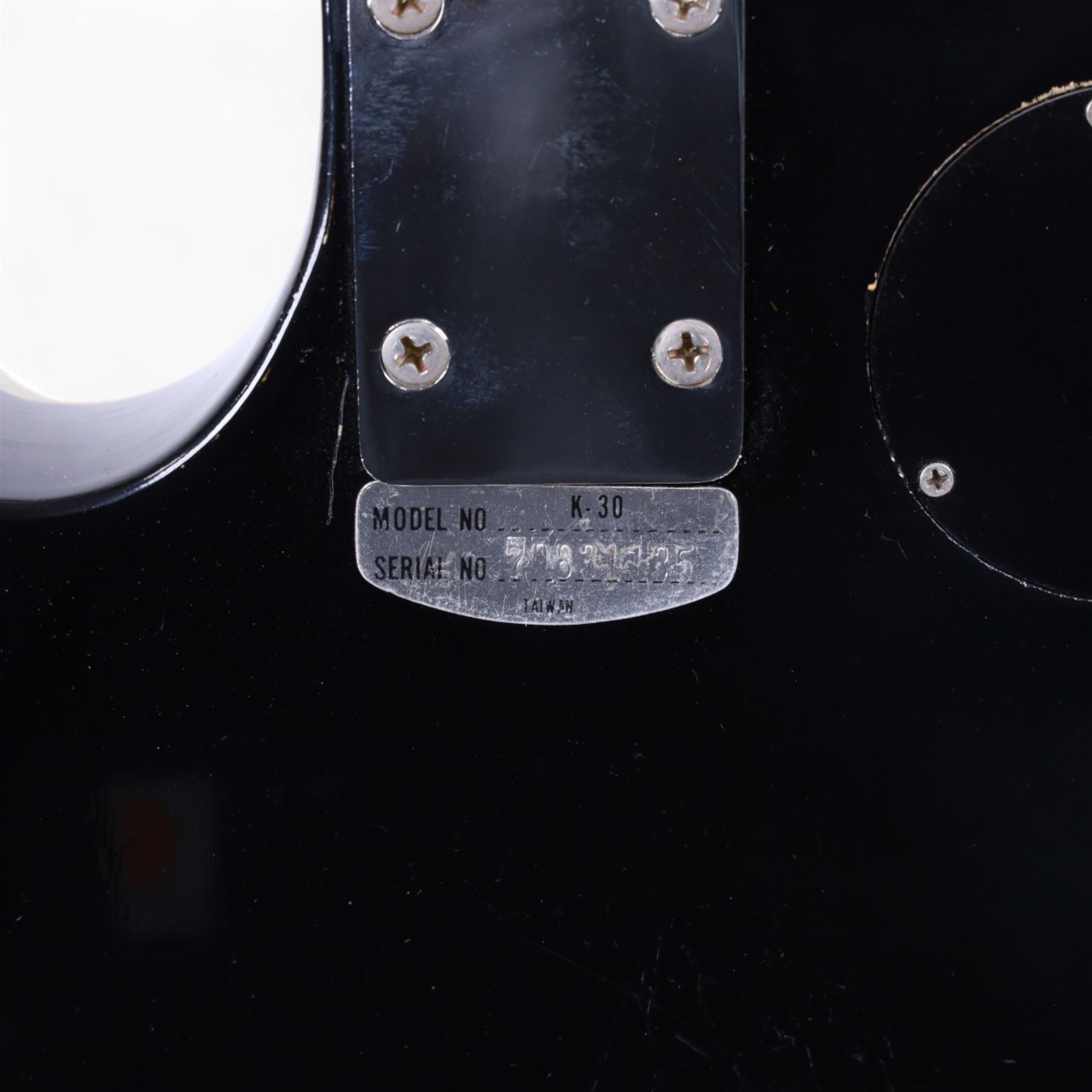 Kay K30 Les Paul style electric guitar, black body and scratch plate, serial no. 70831135, in black hardcase, guitar L100cm