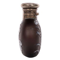 Victorian Thomas Webb silver mounted cameo glass scent bottle, hallmarked Sampson Mordan and Co, London 1884, the cameo glass body of circular form, decorated with white flowers and foliage in high relief upon a black ground, the hinged cover opening to reveal the original stopper, H6cm 