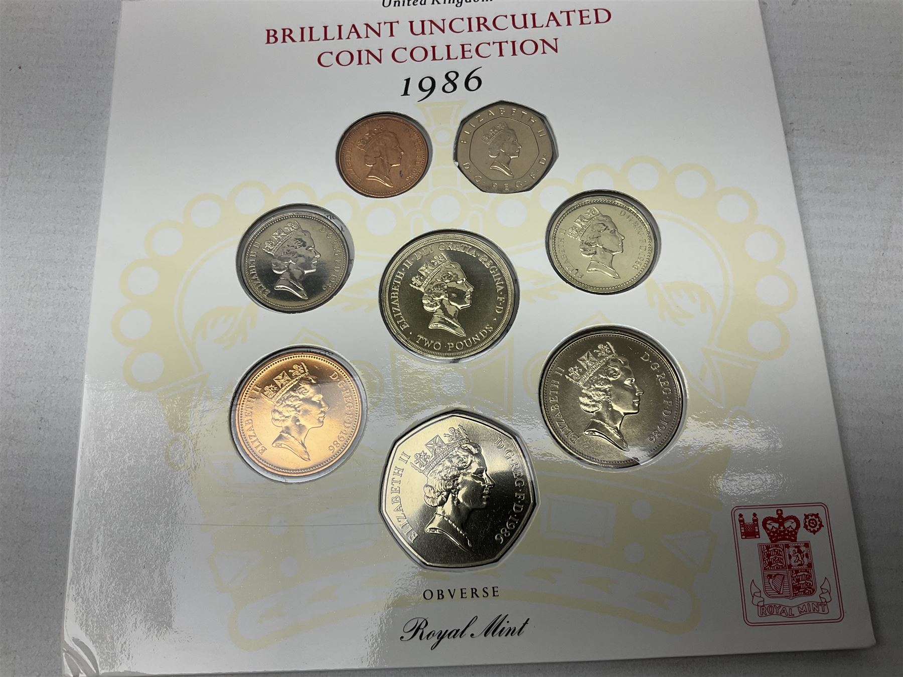 Thirteen The Royal Mint United Kingdom brilliant uncirculated coin collection dated two 1985, two 1986, two 1987, 1988, two 1989, two 1990, two 1991, all in card folders