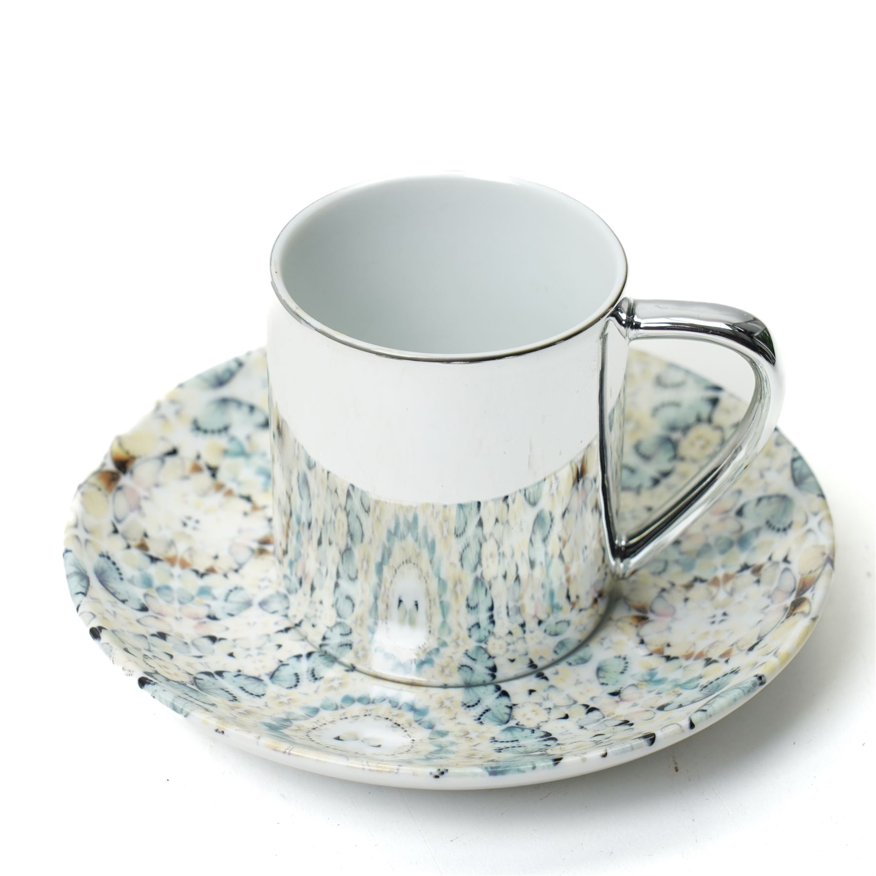 Damien Hirst (British 1965-); set of six anamorphic silver lustre espresso cups and saucers of various designs