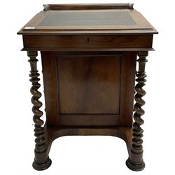 Victorian walnut Davenport, hinged sloping top with inset leather writing surface, enclosing satinwood lined interior with two drawers over faux drawer, fitted with inkwell drawer and pen compartment to the side over four drawers with an opposing false set, raised on spiral turned supports united by a shaped platform base