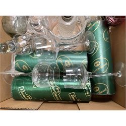 Caithness 'Fireball' paperweight, together with four cased Tyrone Crystal glasses, glass oil lamp, three glass decanters etc, in two boxes