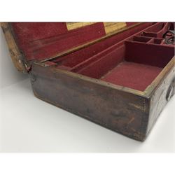 Leather shotgun case, the red baize lined interior with the trade labels of Westley Richards & Co., London, a brass plaque inscribed 'T Nevin, Mirfield, Yorkshire' to cover, with key, case to fit barrel 76cm (30 inches)  
