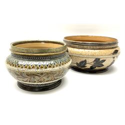 Two 19th century Doulton Lambeth bowls, each with silver plated rims, the first example decorated with vine leaves against a ditsy foliate backdrop, with impressed marks and monogrammed for George Hugo Tabor beneath, H13.5cm D23.5cm, the second example decorated with various foliate bands, with impressed marks and monogrammed for Louise E Edwards beneath, H13.5cm D17.5.