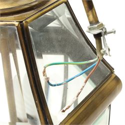 Two light hall lantern in metal and bevelled glass case, drop H64cm
