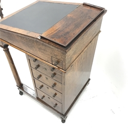 Early 19th century rosewood davenport, sloped hinged top enclosing two drawers and two false drawers with satinwood facias, four drawers, slide and hinged pen drawer, turned front supports on sledge platforms, on castors, W49cm, H86cm, D59cm
