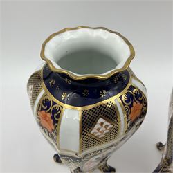 Pair of early 20th century Royal Crown Derby Imari 1128 pattern vases, of tapering straight sided form with waisted neck and frilled rim, upon four splayed feet, with printed and painted marks beneath including illustration date codes for 1911 and 1920, H17cm