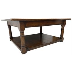 Rectangular oak coffee table moulded frieze rail on turned supports, united by undertier