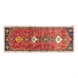 South West Persian hand-knotted Qashgai runner, madder-red field with a central column of ...