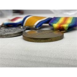 Made-up group of three WWI medals comprising 1914 Star awarded to 23598 Gnr. F. Jefferson R.G.A., British War Medal and Victory Medal with names removed; with ribbons on wearing bar; 1942 Motorist's Medal and small quantity of cap badges, Royalty badges etc