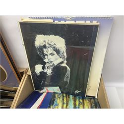 Mostly Queen and Freddie Mercury interest items, including pin badges, newspaper cuttings, diecast 'promotional' vehicles, special edition Pop Rocks figure of Freddie Mercury, VHS tapes, two charity certificates signed by Brian May and Roger Taylor, poster etc, in two boxes 