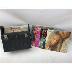 Large quantity of vinyl LPs, predominantly rock and pop, to include Elvis, Elton John, The Kinks, Deep Purple, Eurythmics, Whitney Houston, Phil Collins, Rolling Stones etc, in three boxes, together with quantity of 45 rpm records, Steepletone SRP1R-11 record player and record carry case