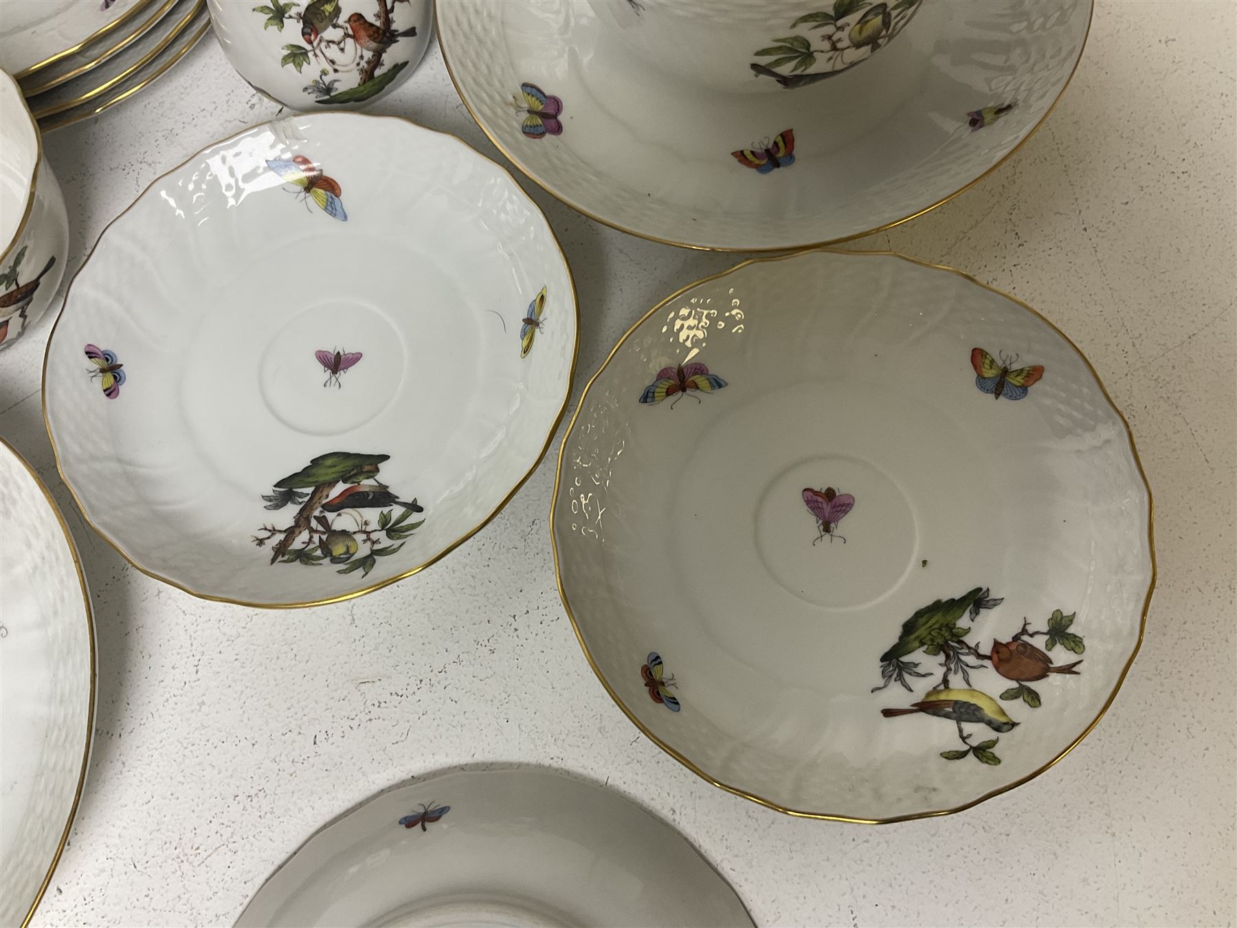 Herend of Hungary Rothschild bird pattern, part tea service, comprising two large teacups and saucers, two teacups and three saucers, milk jug, sugar bowl, five dessert plates and two side plates (18)