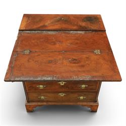 Early 20th century Georgian design figured walnut bachelor's chest, with half fold over top and lopers, over three drawers with pierced brass handles and escutcheons 