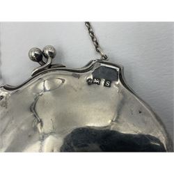 Early 20th century silver mounted coin purse, with leather interior and finger chain, hallmarked Samuel M Levi, Birmingham 1917, together with a similar Edwardian example, with engraved initials and engine turned decoration, hallmarked Birmingham 1907, maker's mark worn and indistinct, largest W11.3cm