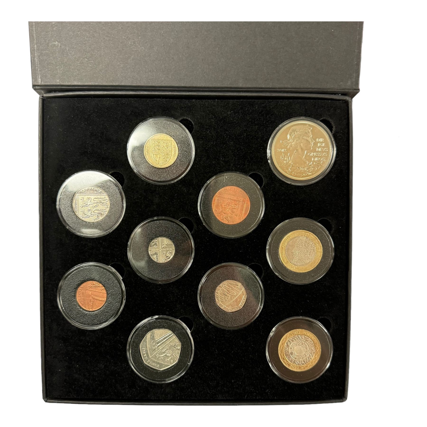 Mostly commemorative coins, medallions and fantasy coinage, including various 'Sainsbury's Makers of the Millennium' medal collection folders containing various medallions, The Toer Mint commemorative four medallion set in fitted case, Queen Elizabeth II 1982 silver proof piedfort twenty pence coin cased with certificate, various part filled The London Mint office folders etc