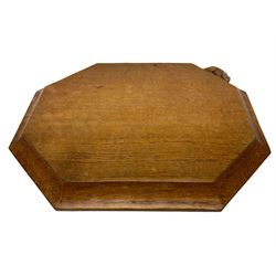 Mouseman - adzed oak breadboard, canted rectangular form with moulded edge carved with mouse signature, by the workshop of Robert Thompson, Kilburn, W31cm D26cm
