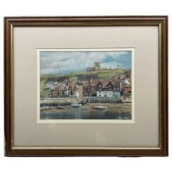 Edward Nolan ARCA (British 1934-): Yachts Moored beside Tate Hill Pier Whitby, pastel signed 22cm x 30cm 
Provenance: with The Penny Hedge Gallery Whitby, label verso