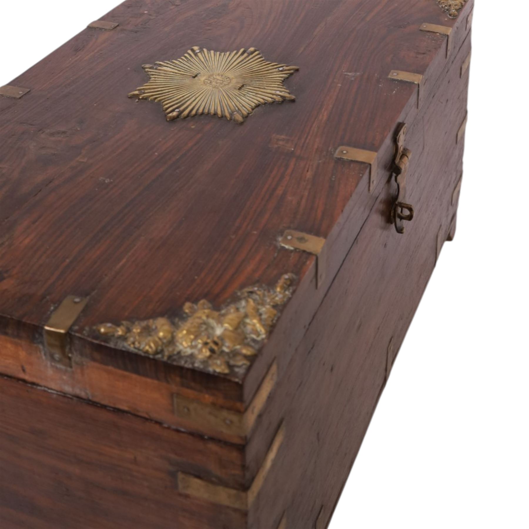 Anglo Indian brass bound chest, the hinged lid with central brass star and floral motifs to the corners, opening to reveal a fitted tray, H30cm, D30cm  