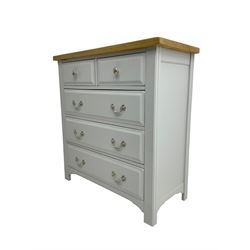 Painted chest with oak top, fitted with two short and three long drawers, raised on square supports with shaped apron, in cream finish