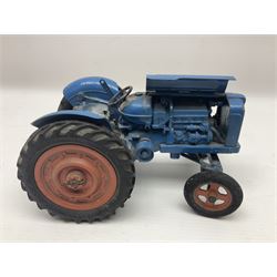 Chad Valley - two unboxed and playworn large scale Fordson tractors - No.9235 Fordson Major Tractor, dark blue diecast body, orange wheels, crank handle clockwork mechanism and 'Firestone' rubber tyres; and No.M59 New Fordson Major Tractor, blue diecast body, tinplate hinged bonnet, orange wheels and clockwork motor contained in rear wheel hub (2)