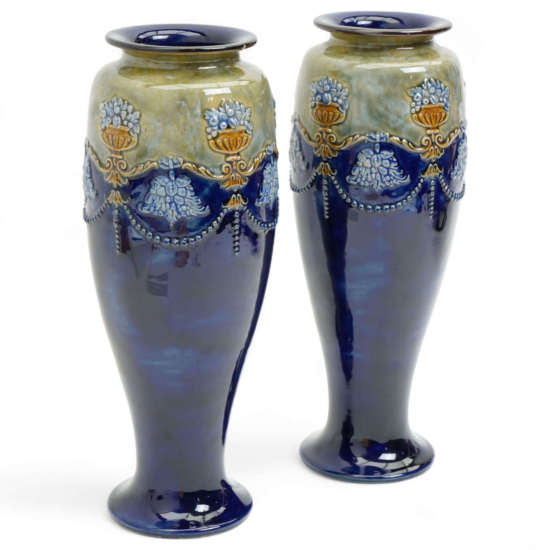 Pair of Royal Doulton stoneware vases, of baluster form, each with raised swag decoration, impressed marks to base with incised initials 'LB', numbered 6698, H29cm