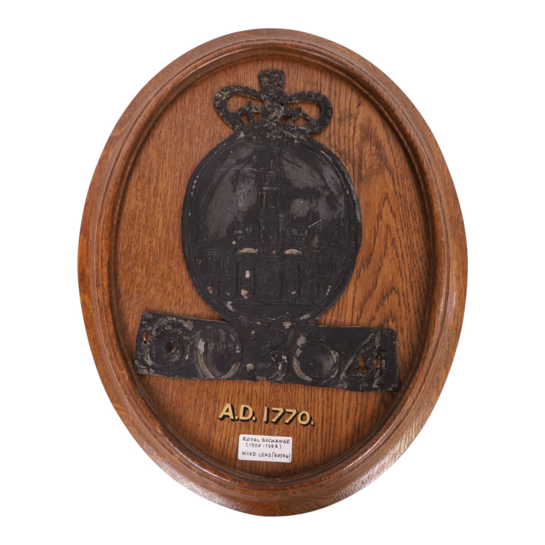 Two 19th century fire insurance marks, comprising tin County Fire Office, mounted upon oak backing, Lead Royal Exchange Assurance, mounted upon circular oak frame, together with a Milners' Fire Resisting Safe plaque, 