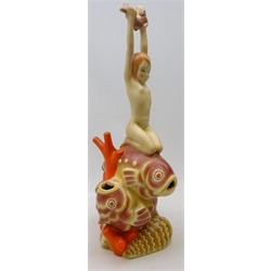  Art Deco Lenci figure by Helen König Scavini  'Trofeo' c1936, modelled as a nude girl kneeling upon two fish entwined in coral, her arms outstretched holding a fish, signed to base 'Lenci Made in Italy 1936', H51cm   