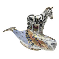 Two Royal Crown Derby paperweights, comprising Oceanic Whale, with gold stopper and Baby Zebra, with gold stopper, both with printed mark beneath and original box