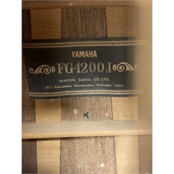 Rare Yamaha FG-1200J acoustic guitar, spruce top, solid Jacaranda back and sides, ebony fret board, mother-of-pearl bound top, three-piece back with abalone trim, in carrying case