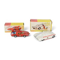 Two Dinky Toys diecast Captain Scarlet vehicles, comprising Spectrum Patrol Car no. 103, with red metallic body, white base, blue tinted windows and silver trim and Maximum Security Vehicle no. 105, the white body with red stripes and base, chrome trim and cast spun hubs, with radiation box, both boxed