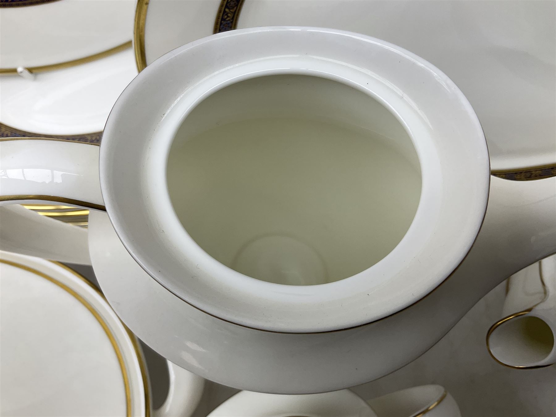 Royal Doulton Harlow pattern tea and dinner service for ten, consisting tea pot, coffee pot, milk jug, open sucrier, cups and saucers, dessert plates, dinner plates, soup bowls, side plates, sauce boat, covered serving dishes, meat plate (67)
