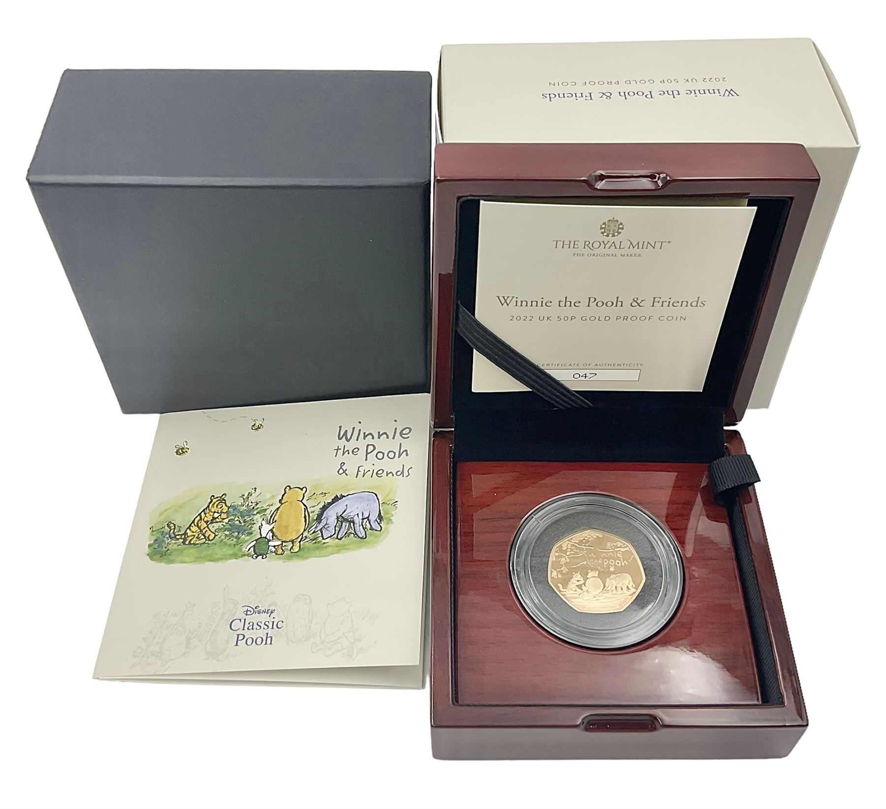 The Royal Mint United Kingdom 2022 'Winnie the Pooh and Friends' gold proof fifty pence coin, cased with certificate