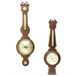 Early 19th century mahogany banjo barometer, scroll pediment over dry/damp and thermometer dials with brass registers, by ‘Crowden & Garrod, London’ (H107cm), and an early 20th century walnut and satinwood banded barometer by ‘Aitchison, London’ (H96cm)