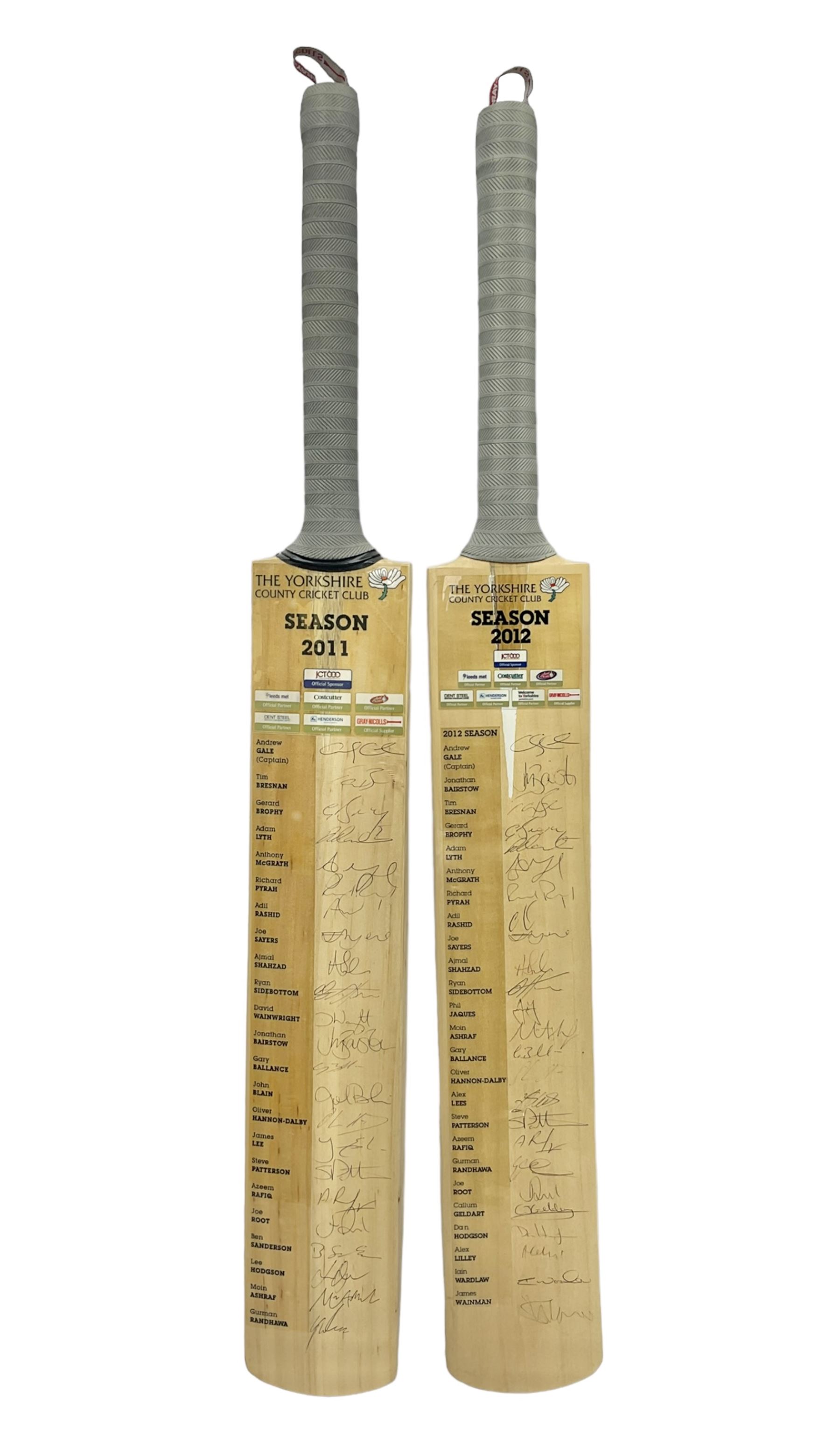 Two signed Yorkshire County cricket bats, from 2011 and 2012 seasons, bearing signatures including Adil Rashid, Andrew Gale, Ryan Sidebottom, Gary Ballance etc