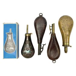Two brass mounted leather shot flasks with thumb action nozzles; Dixon & Son Improved patent plain copper and brass powder flask; and modern Italian .44 calibre embossed copper and brass powder flask in original box (4)