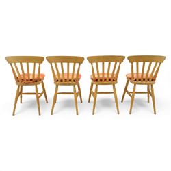 Late 20th century pine farmhouse dining table, rectangular top raised on turned legs, together with a set of matching spindle-back chairs with padded seats