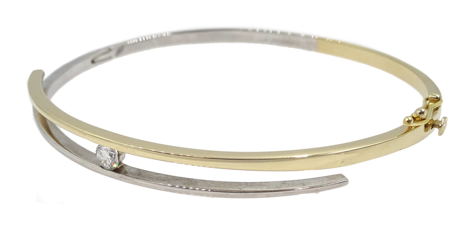 18ct gold and white gold diamond set hinged bangle, stamped 750, with