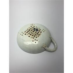 Late 18th/early 19th century Leeds Pottery egg drainer, the pierced bowl of circular form decorated with blue transfer printed floral spray and floral border, the twisted handle with foliate mounts, bowl D9cm